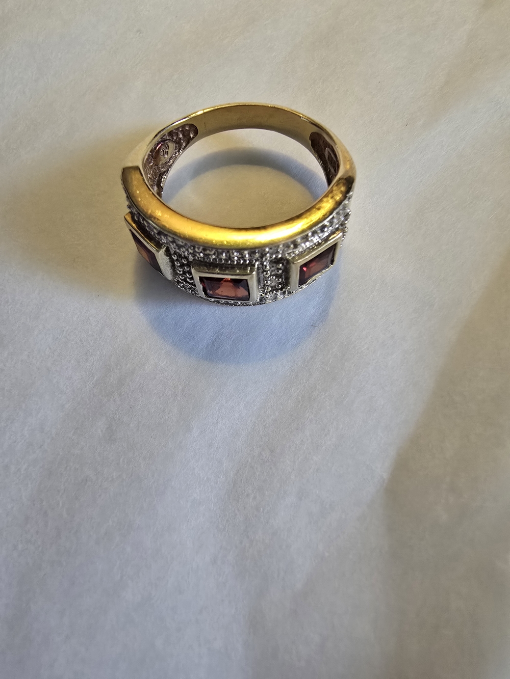 10k Gold Ring with 3 Garnets And Diamond Accents